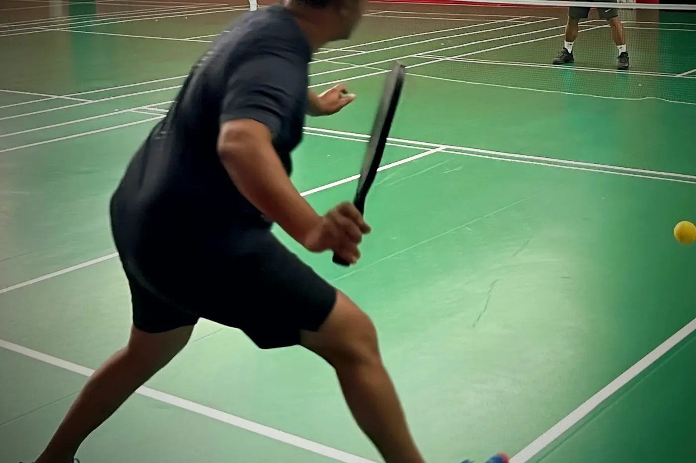 A pickleball rally at PlayPoint